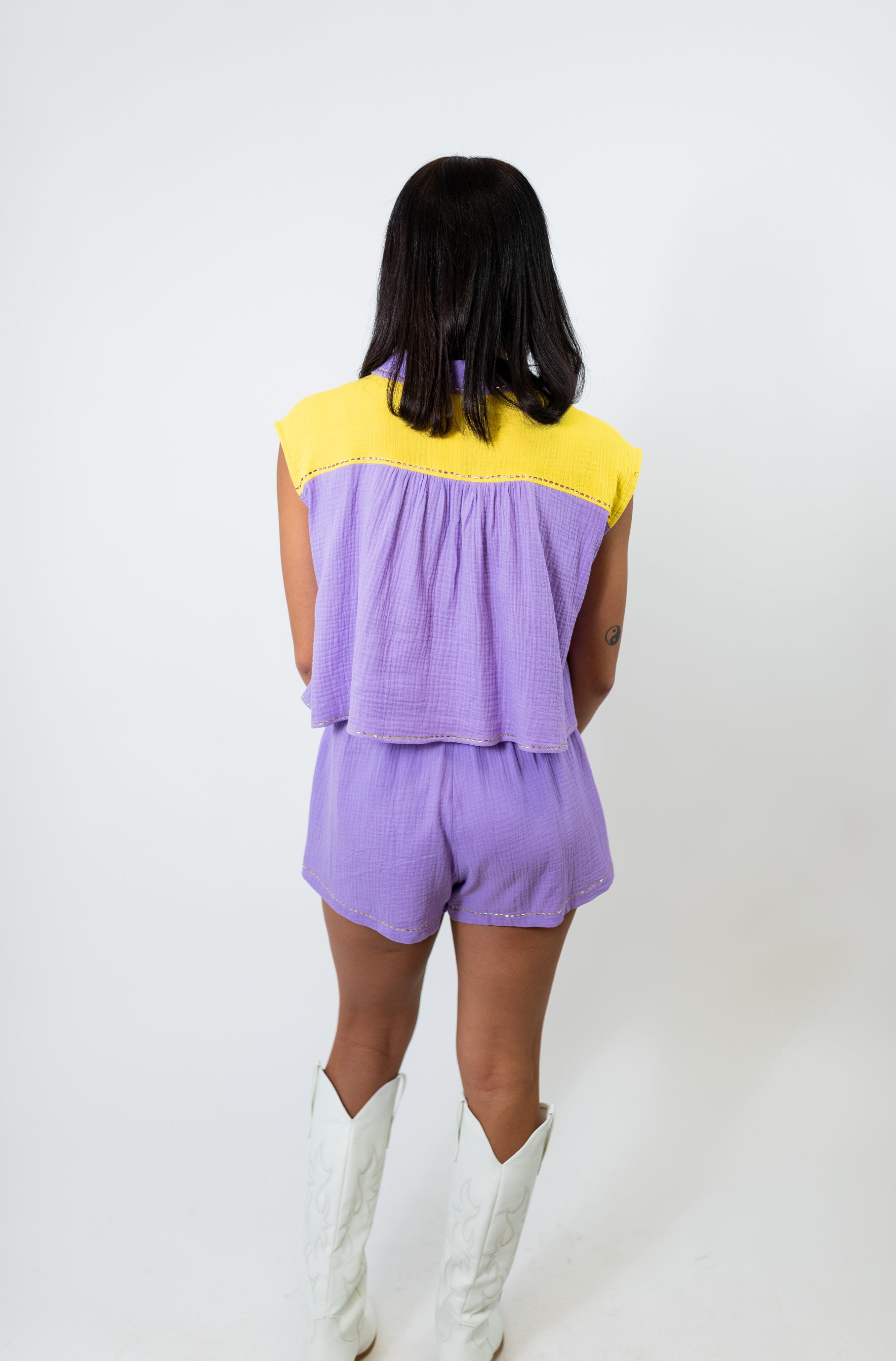 Queen of Sparkles White Purple and Yellow Queen Romper - Material